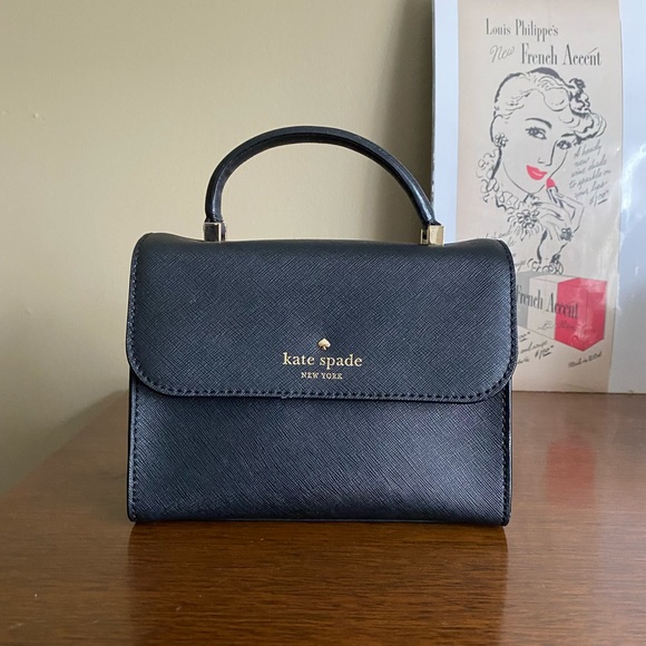 kate spade Handbags - Kate Spade Cedar Street Mini Nora
